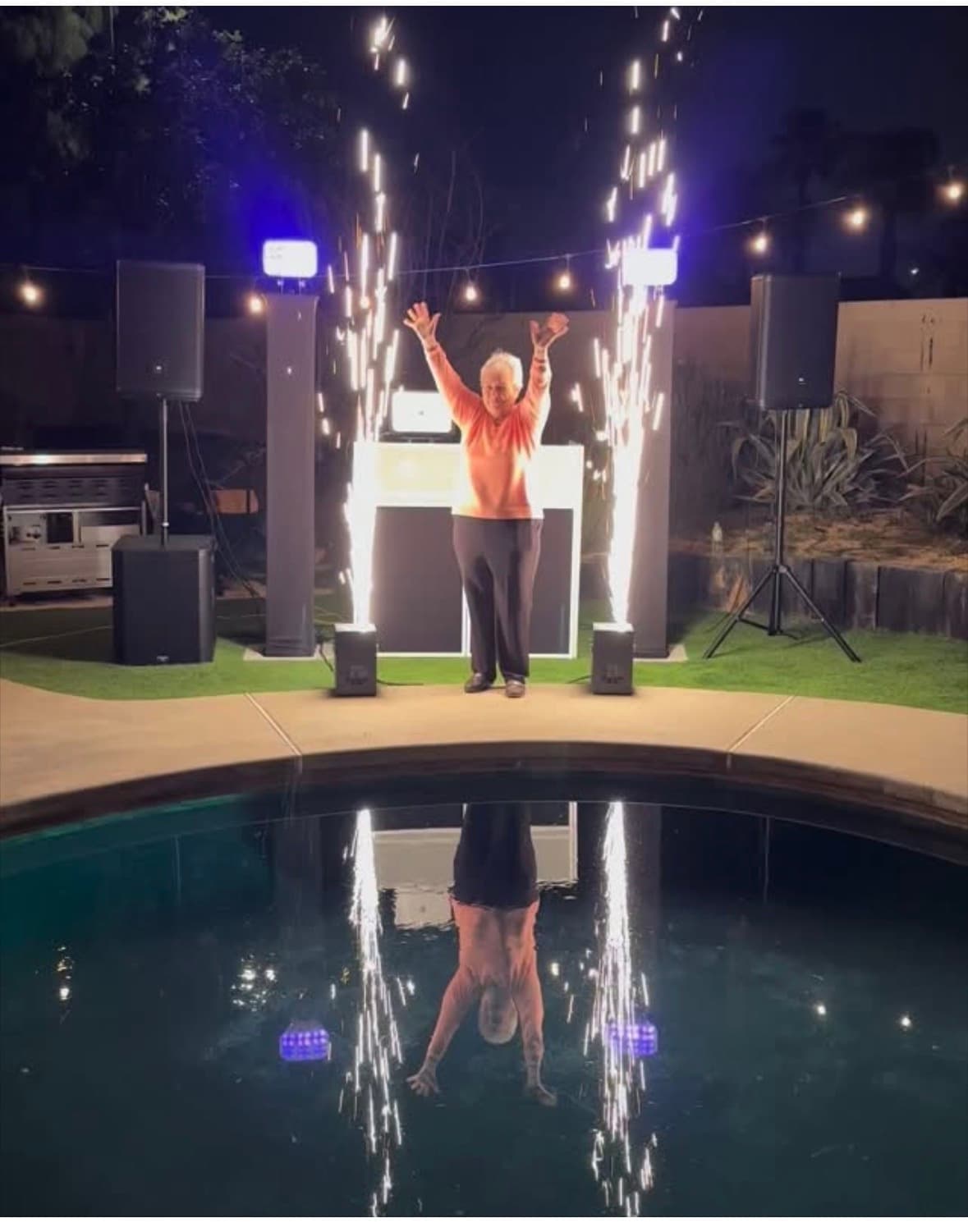 Poolside spark fountain moment